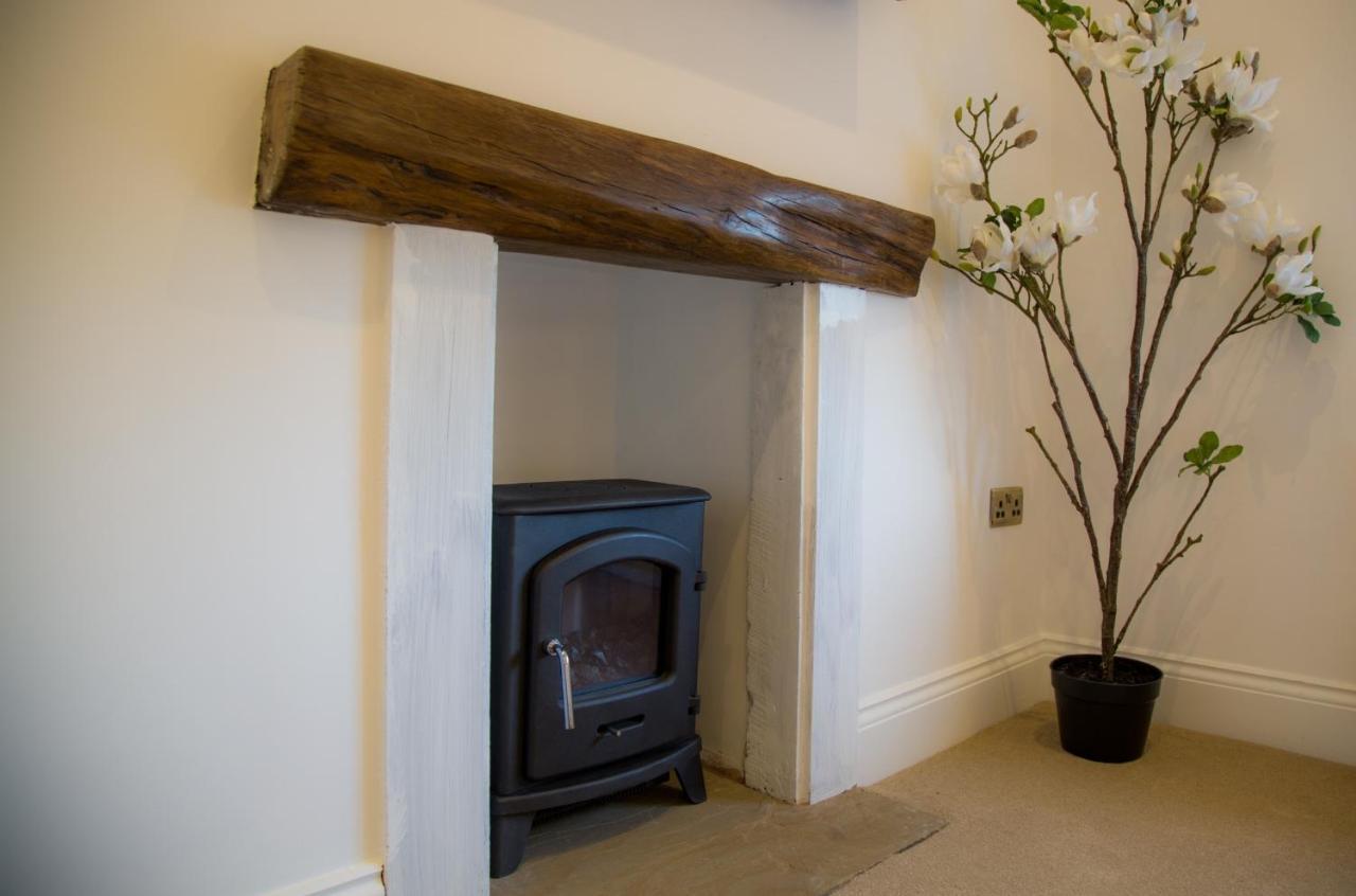 Winckley Stays Preston  Dış mekan fotoğraf A fireplace with a log burning stove